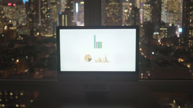 analyzing business profits progress on computer screen 