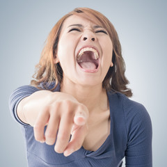 woman pointing and laughing at you