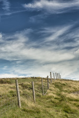Obraz premium Magnificent landscape of rock formations and moorland at Stanage Edge in the Peak District in Derbyshire, a stunning area of great natural beauty covering 555 square miles across central England