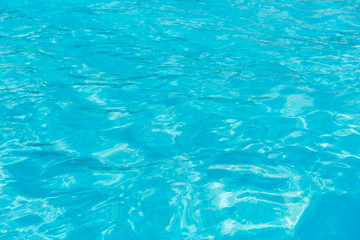 Swimming pool with sunny reflections