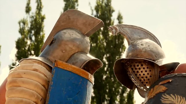 gladiator warriors fighting against each other. 