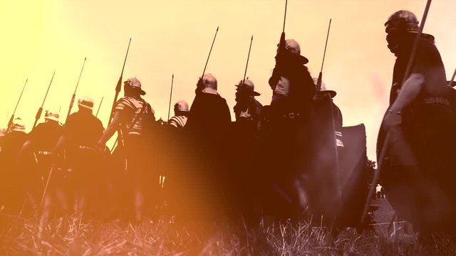 troop of historical gladiators marching together. 