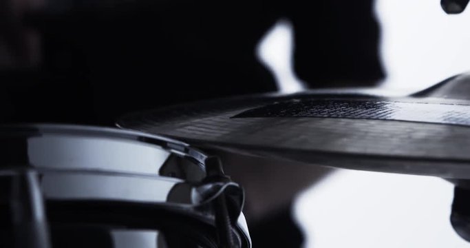 Close Up Of Drummer Playing Drum Kit In Studio 