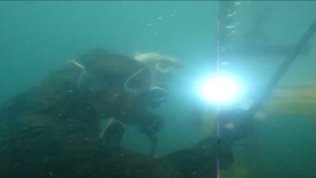 The man welding underwater 