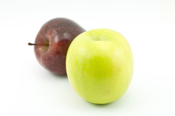Red and Green Apple Fruit, The apple tree is a deciduous tree in the rose family best known for its sweet, pomaceous fruit, the apple. 
