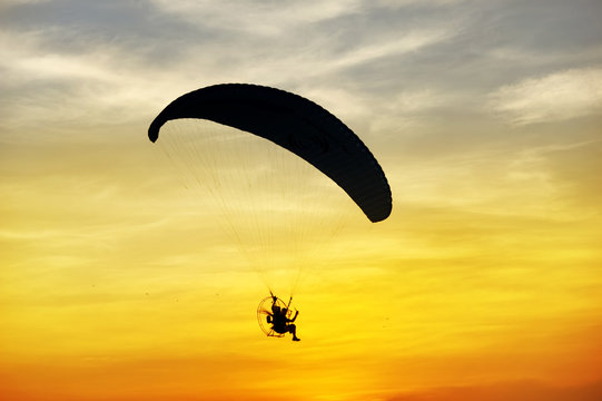 silhouette of para motor glider