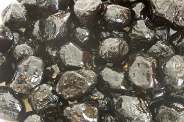 This is a photograph of SunDried Black Oilves