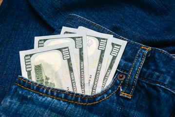 one hundred bills in pocket