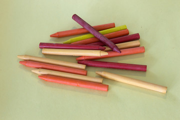 This is a photograph of Red,Orange and Yellow crayons background