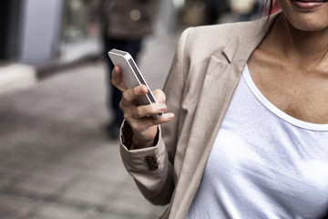 Woman texting on the phone