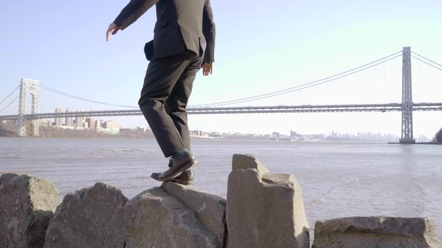 man overcoming obstacles and succeed in business career. recreational activity