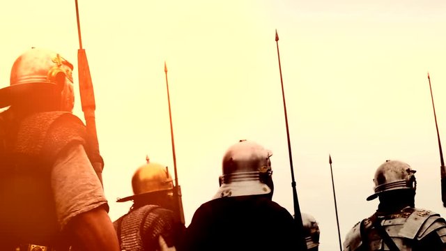 troop of historical gladiators marching together. 