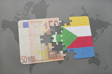 puzzle with the national flag of comoros and euro banknote on a world map background.