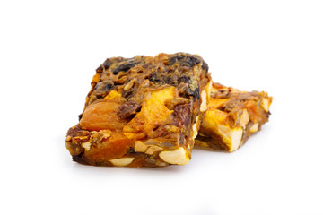 Tasty vegetarian granola crumble cake with dried fruits isolated