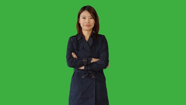 portrait of young asian business man isolated on green screen background