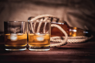 bourbon whiskey rum in a glass with ice