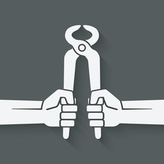 worker hands with pincers