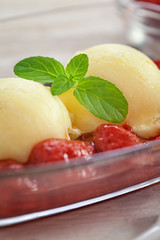 Vanilla ice cream with strawberry and mint 