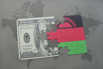 puzzle with the national flag of malawi and dollar banknote on a world map background.