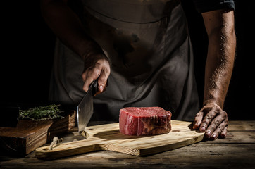Chef butcher prepare beef steak