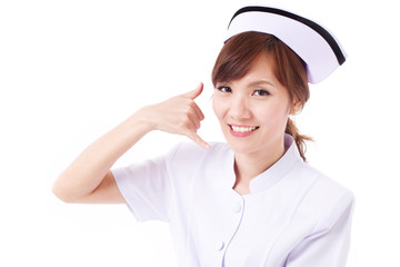 asian nurse with hand gesture of contact us, information, FAQ, help line or assistance