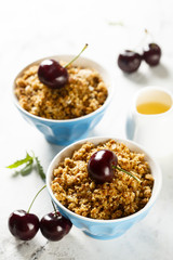 Homemade granola with honey and cherries