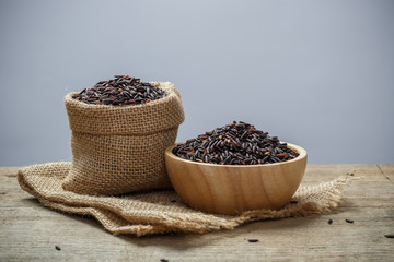 Black Rice on wooden table