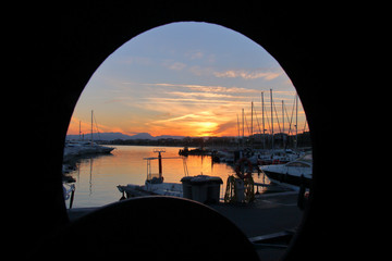 View from the window at the sunset over the marina.