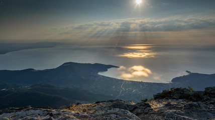 Sunrise over Thassos Island, Greece - view from Mount Ipsarion - beautiful sunlight over the sea - amazing seascape