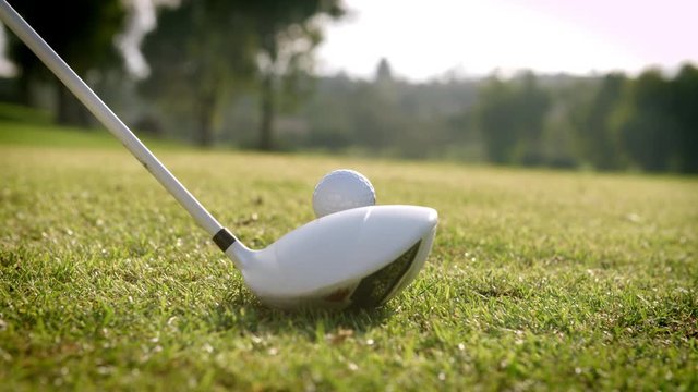 Close Up Of Golfer Hitting Tee Shot In Slow Motion