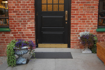 front door with flower vases, the main entrance to the school, decor, exterior
