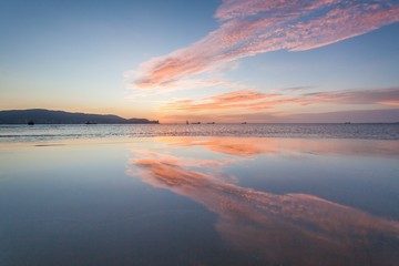 Reflection Sunrise or Sunset View With Orange Cloud and Blue Sky