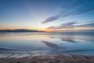 Reflection Sunrise or Sunset View With Orange Cloud and Blue Sky