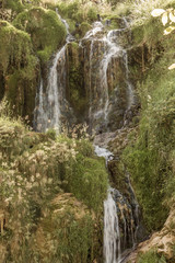 Beautiful waterfall, cascade in valley Chateau-Chalon