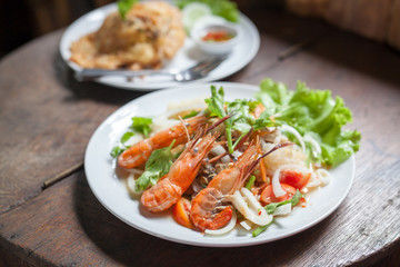 seafood salad on wooden table