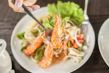 seafood salad on wooden table