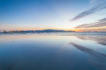 Reflection Sunrise or Sunset View With Orange Cloud and Blue Sky