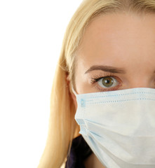 Woman wearing mask isolated on white