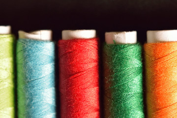 Macro Background of colorful sewing thread