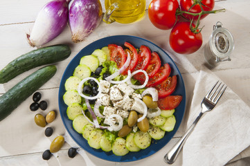 plate of Greek salad and ingredients