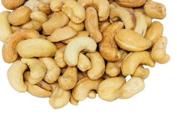 Cashew nuts on the white background.