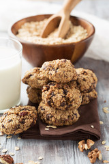 Homemade Oatmeal cookies and a glass of milk, selective focus