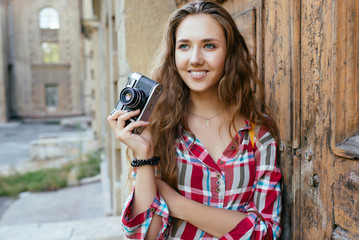 young beautiful girl photographer