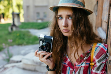 portrait of a girl with a camera