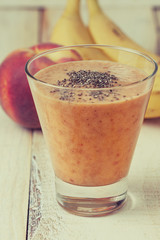 peach banana smoothie in a glass (toning)