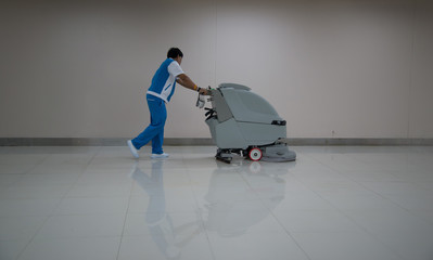 cleaning floor with machine