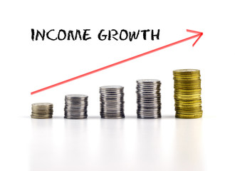 Stacks of coins on white background