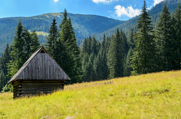 Small village cottage in the mountain valley. 