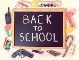 top down concept of education with text back to school is writte