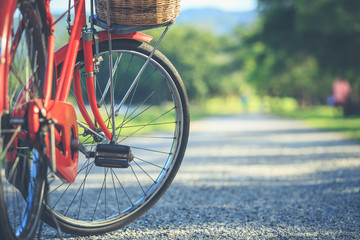 Red Japan style classic bicycle at the park